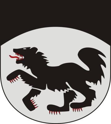 Kuva Kittilän vaakunasta, jossa on hopeakentässä kävelevän ahman yläpuolella kaarilakio